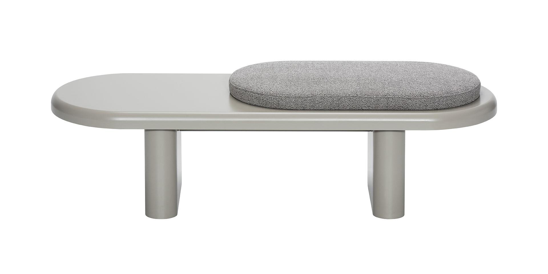 Banc Dolmen gris avec coussin assorti en tissu, style minimaliste et confort assuré.