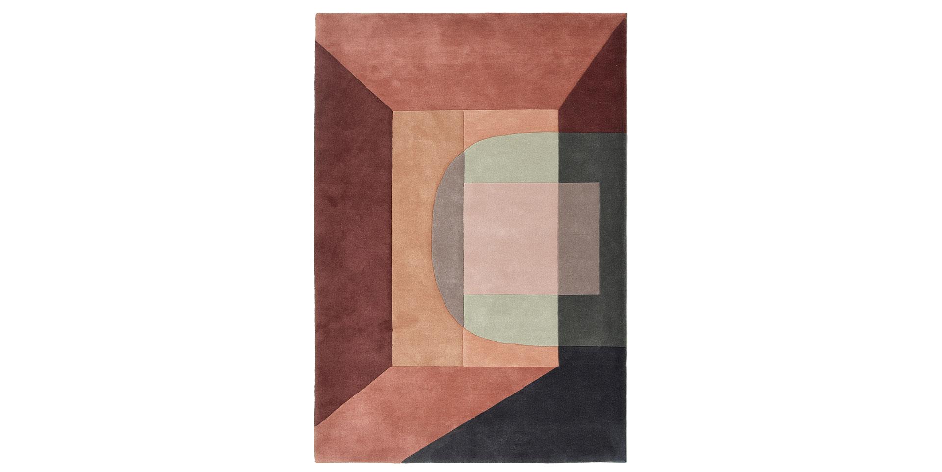 Tapis graphique aux teintes terreuses pour une ambiance chaleureuse et naturelle.