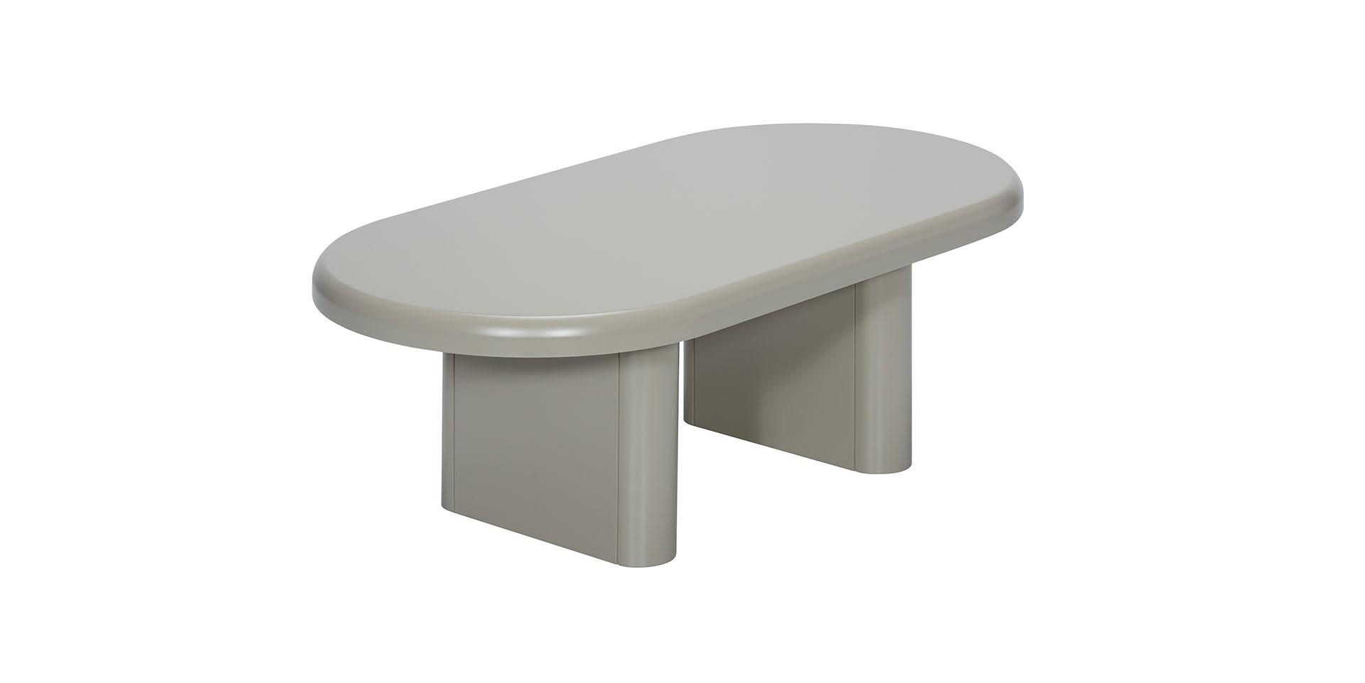Table basse Dolmen de forme ovale en finition grise, design moderne et épuré.